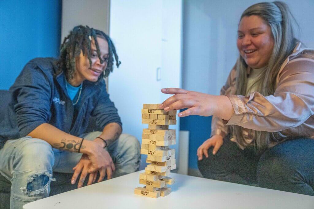 Youth and staff playing Jenga